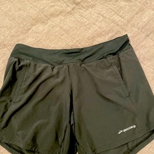 Brooks Chaser 7” inseam shorts. Black, lots of pockets, comfortable fabric.